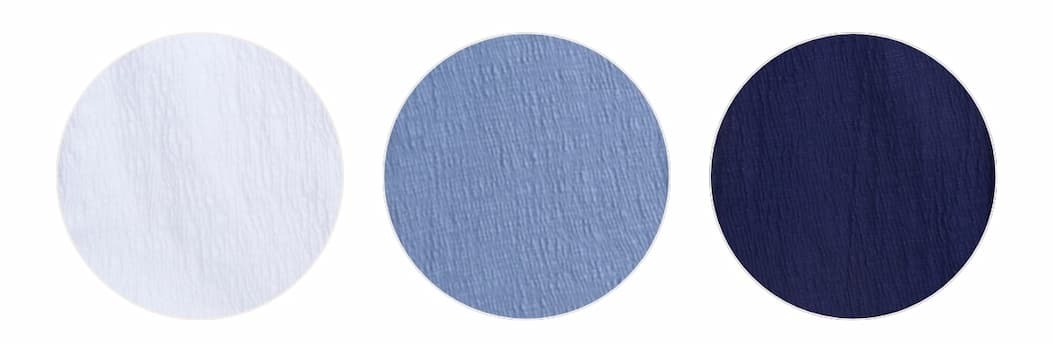 White, light blue, and navy beach shirt swatches