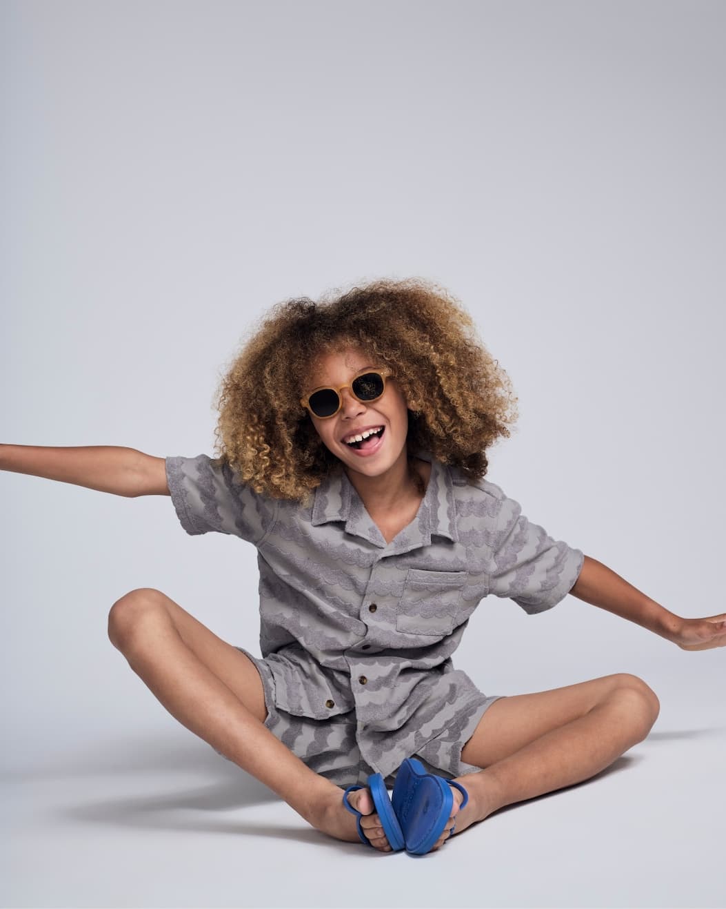 Boy on grey background wearing grey terry set