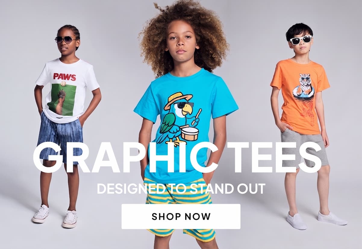 Boys on grey background wearing graphic tees with text graphic tees designed to stand out and shop now button