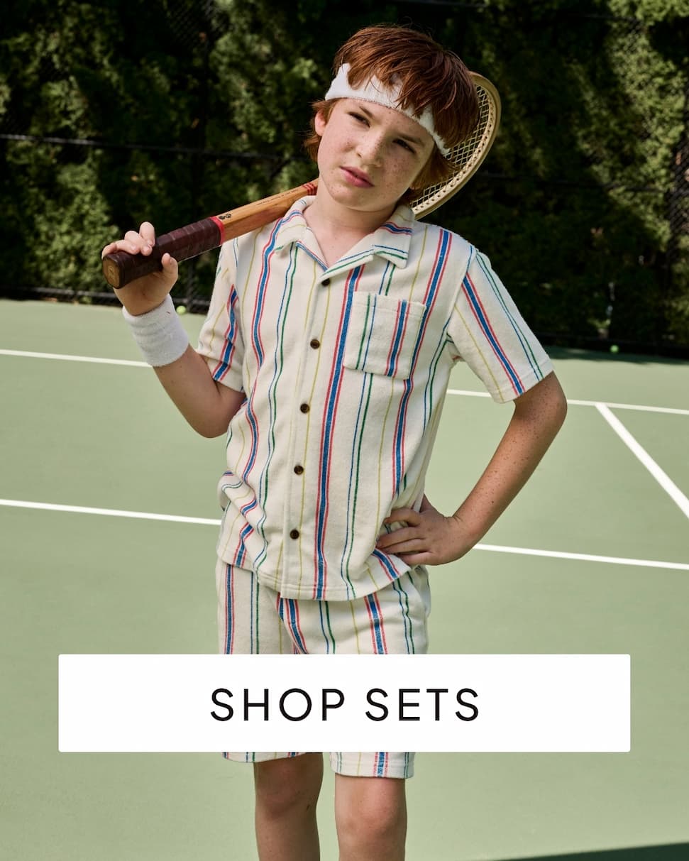 Boy and girl in terry sets with text shop sets