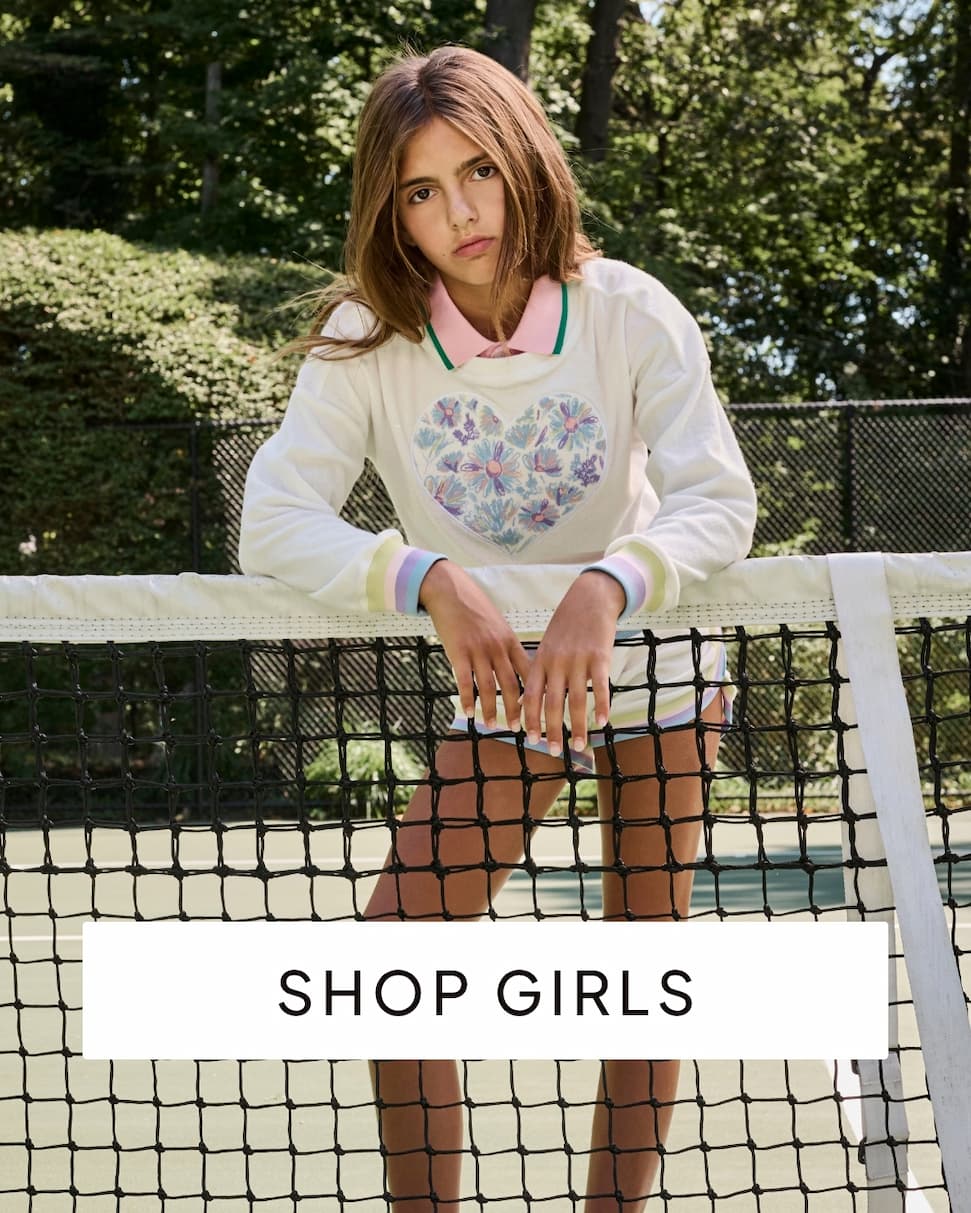 Girl on grey background holding lemon with text shop girls