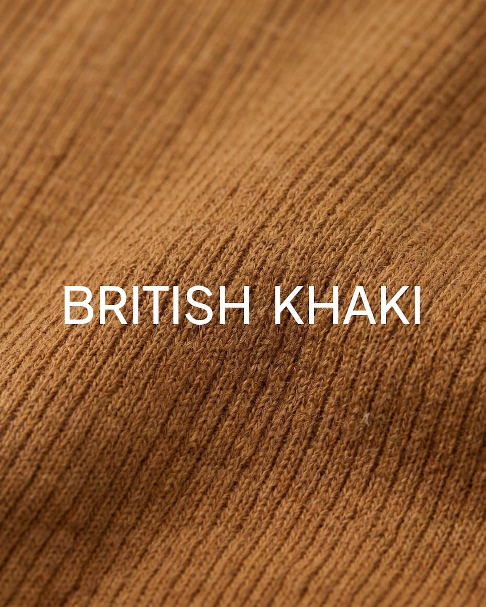 Boys brown henley material close up shot
