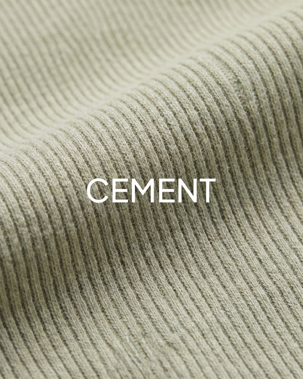 Boys grey henley material close up shot