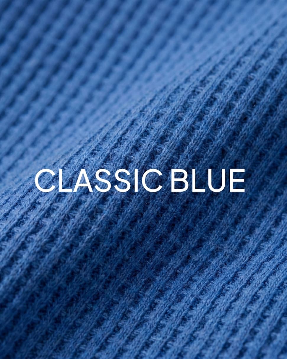 Boys blue henley material close up shot