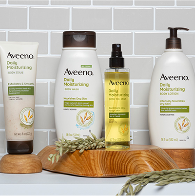 Line up of Aveeno Product bottles for a Shower Routine.