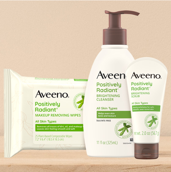 Image of Aveeno Positively Radiant collection of products on a countertop.