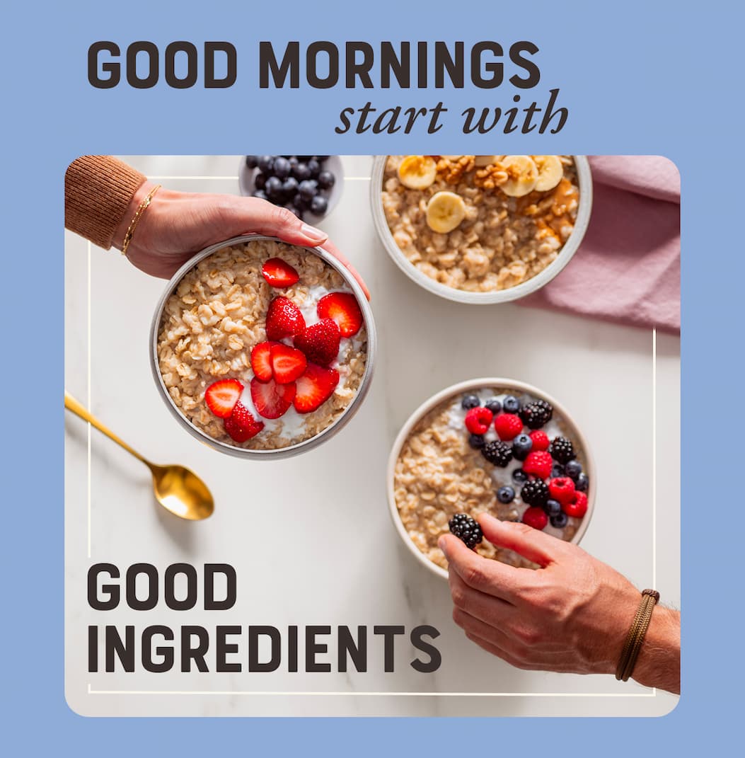 Good mornings start with good ingredients. Image with blue background, two hands holding bowls of oatmeal and fresh berries