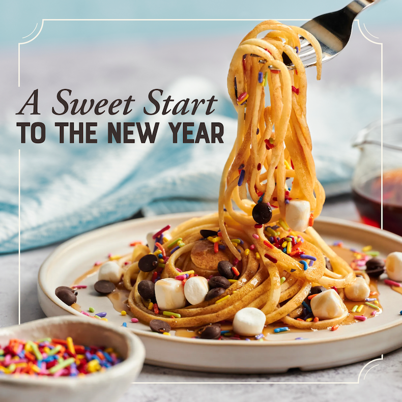 A Sweet Start to the New Year. Image of Pancake Spaghetti topped with sprinkles, chocolate chips and mini marshmallows