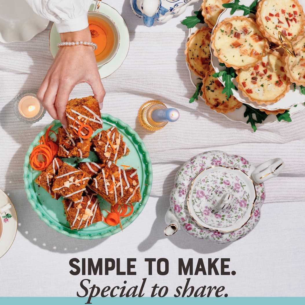Simple to make. Special to share. Image of springtime carrot streusel cake on a green platter.