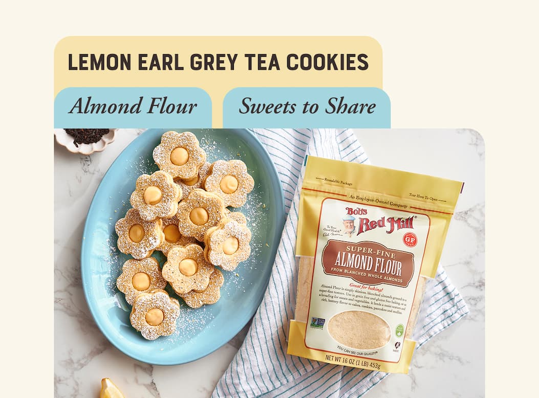 Lemon Earl Grey Tea Cookies. Images of flower shaped cookies with lemon filling on a plate.