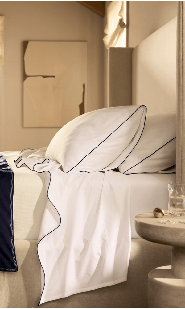 Percale Piped Edge Embroidered with a piped detail that brings refined definition to the bed—without compromising its crisp, cool feel.