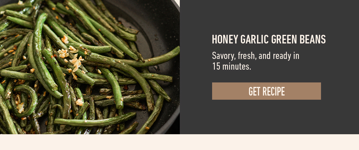 Honey garlic green beans in a skillet with a Get Recipe button. Savory, fresh, and ready in 15 minutes.