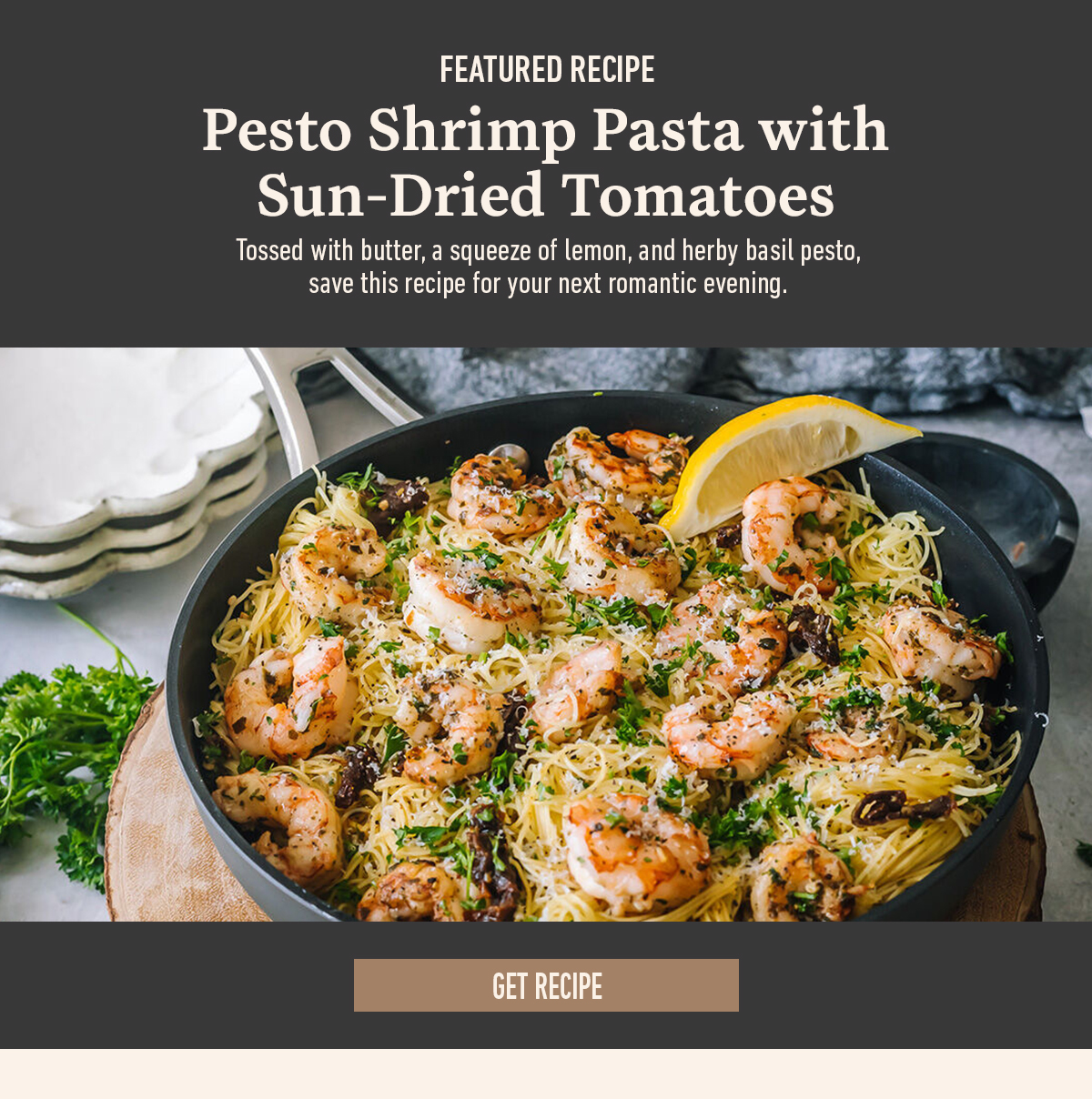 Featured recipe for pesto shrimp pasta with sun-dried tomatoes. Includes a get recipe button and an image of pasta with shrimp and lemon.