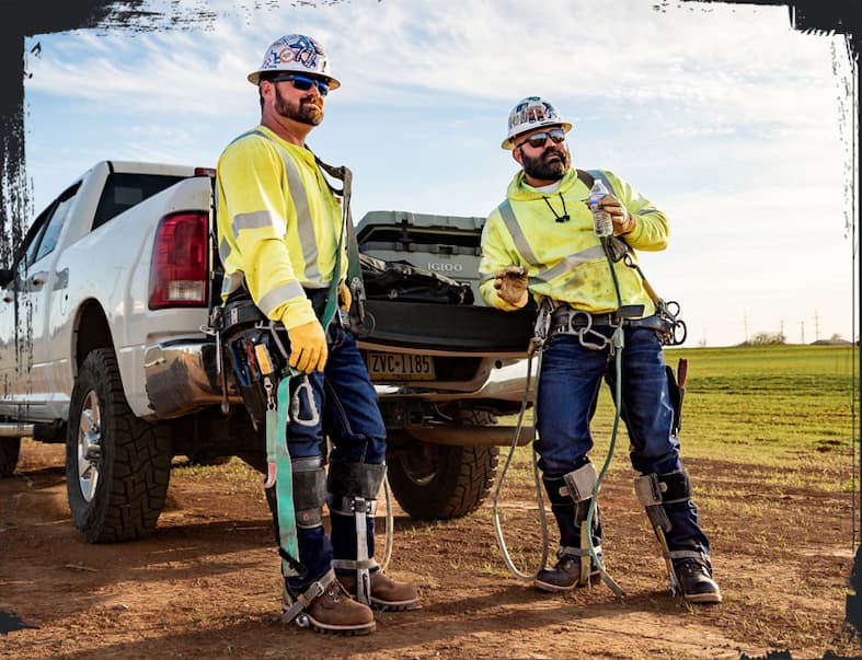 Two loggers wearing Chippewa boots.