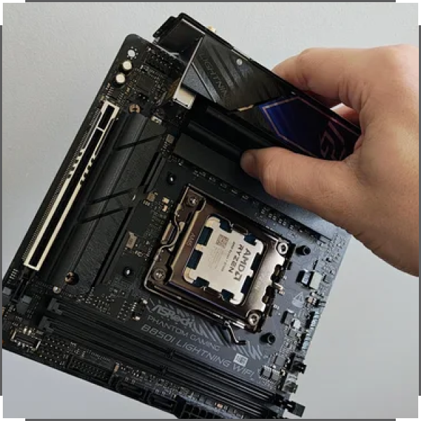 HOW TO HOLD A MOTHERBOARD SAFELY