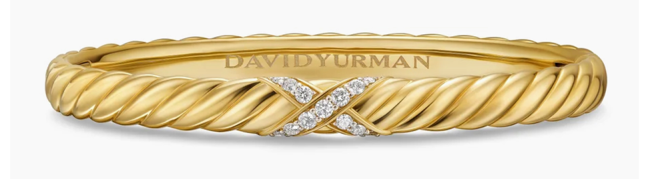 A mesmerizing bangle featuring our iconic X motif in diamond pavé