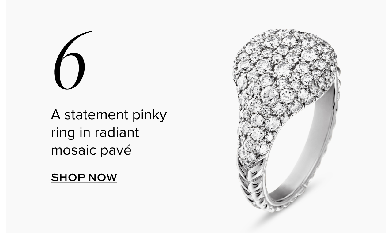 A statement pinky ring in radiant mosaic pavé
