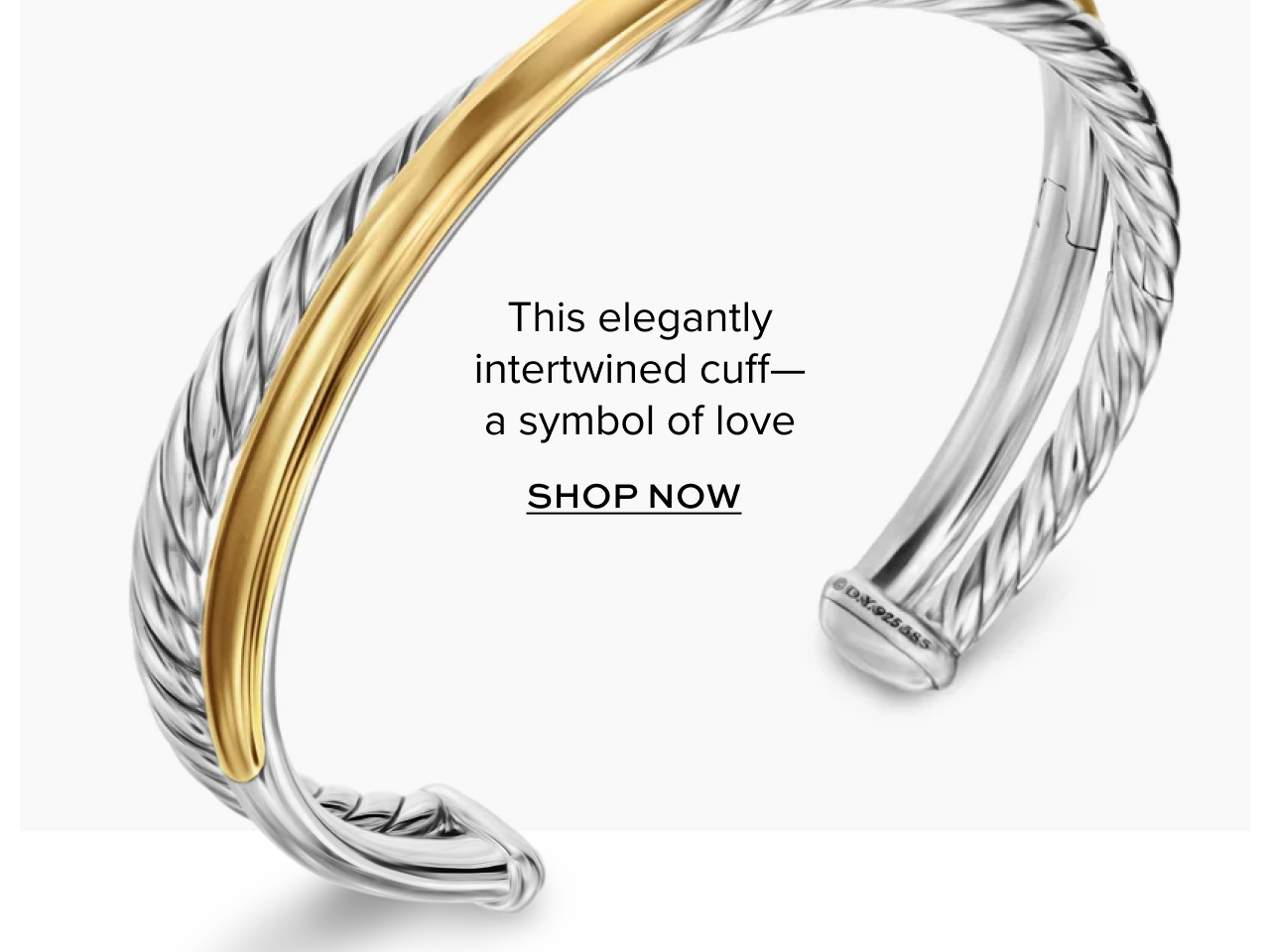 This elegantly intertwined cuff- a symbol of love