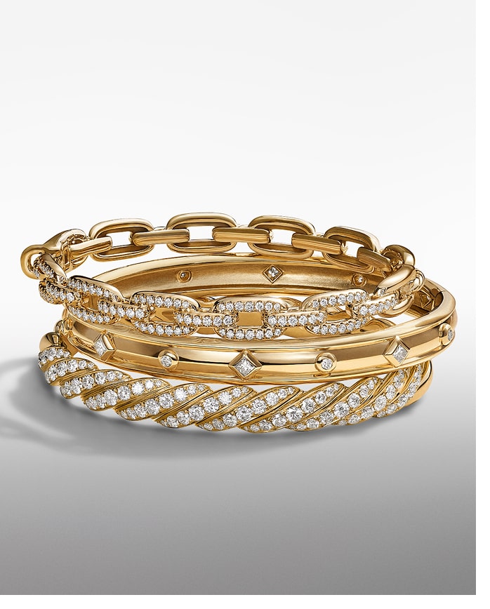 Add Diamonds. Don’t be afraid to mix it up—pair 18K yellow gold with sterling silver styles for added depth and dimension.