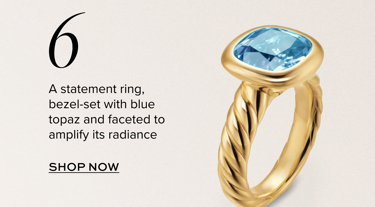 A statement ring, bezel-set with blue topaz and faceted to amplify its radiance. Shop now.