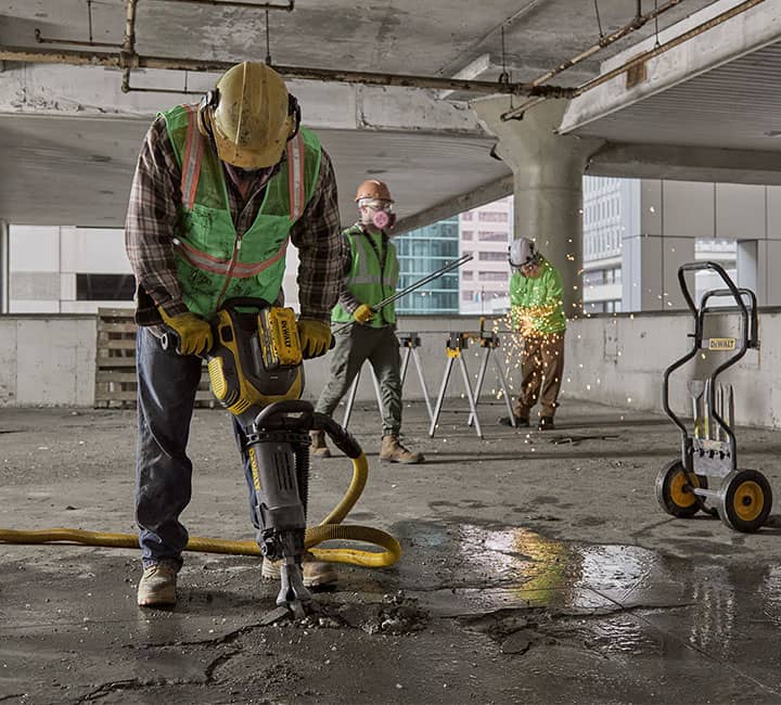20V MAX* demo hammer chipping into concrete floor 