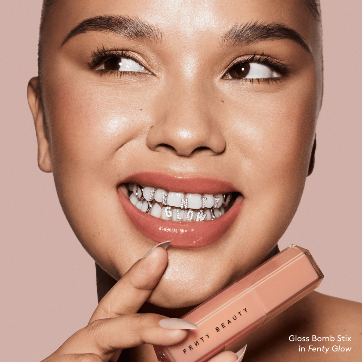 Gloss Bomb Stix in Fenty Glow Trace'd Out Lip Liner in Coal Blooded Fenty Treatz Lip Oil in Barbados Cherry