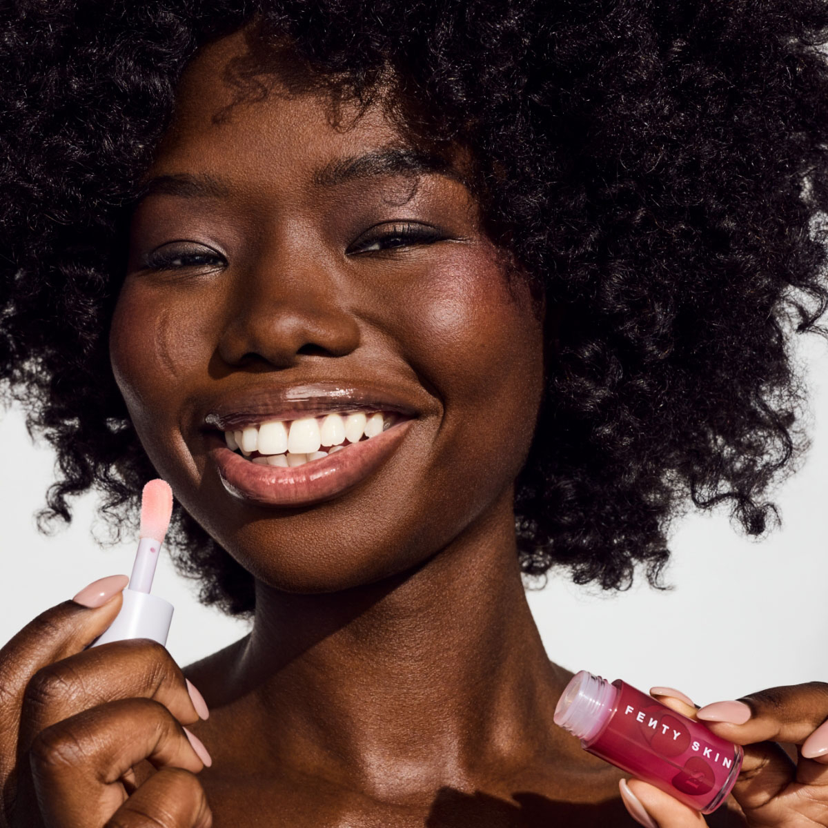 Models wearing Fenty Beauty