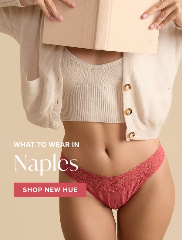 an image of a woman in underwear holding a book