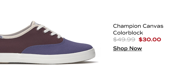 A side view of the Keds Champion Canvas Colorblock Lace-Up in navy/burgundy which was $49.99 and is now $30.00 for a limited time. Shop Now.