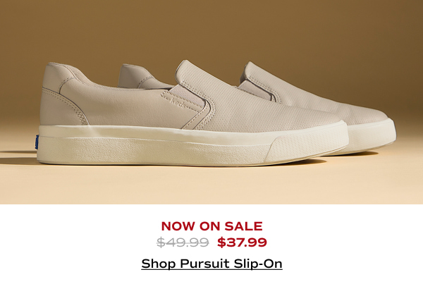 A side view of the Pursuit Perforated Leather Slip-Ons in taupe which were $49.99 and are now on sale for $37.99. Shop Now.