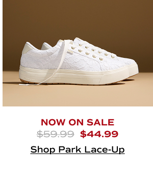A side view of the Park Lace Celebrations Lace-Ups in white which were $59.99 and are now on sale for $44.99. Shop Now.