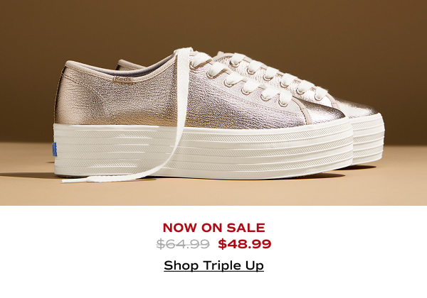 A side view of the Triple Up Metallic Leather Lace-Ups in rose gold which were $64.99 and are now on sale for $48.99. Shop Now.