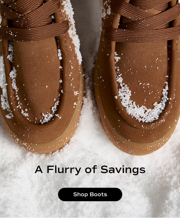 The front of the Explore Bootie Suede in dark brown set in the snow. The email says A Flurry of Savings. Shop Boots.