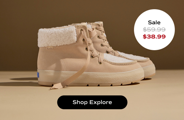 A brown background with a side view of the Explore Bootie Suede Faux Fur in sand. The style was $59.99 and is now $38.99 for a limited time. Shop Explore.