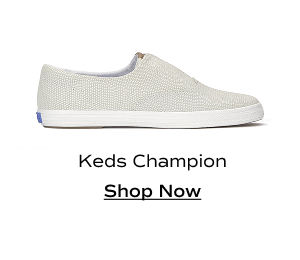 A side view of the Keds Champion Round Toe Dalmata Leather Slip-On in cream. Shop Now.
