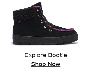 A side view of the Explore Bootie Suede Pop Binding in black. Shop Now.