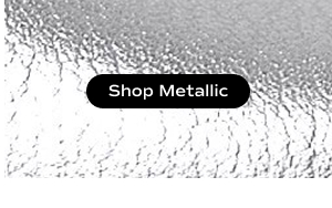 A closeup of silver metallic leather. Shop Metallic.