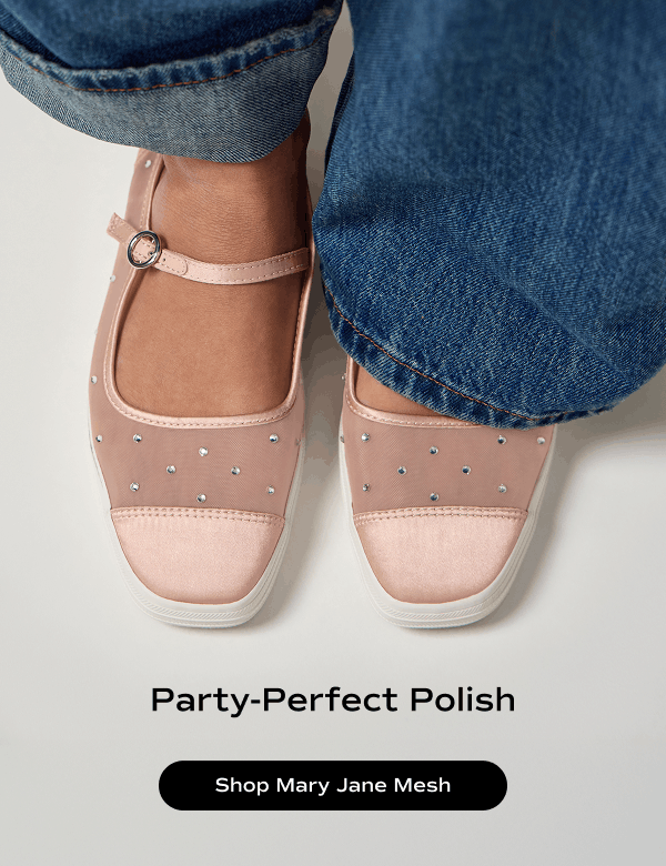 A top-down view of a pair of Square Toe Mary Jane Sheer Mesh Jewel flats shown on foot paired with medium-wash wide-leg jeans. Text on the image says Party-Perfect Polish. Shop Mary Jane Mesh.