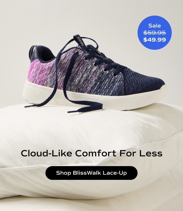 The BlissWalk Ombre Knit Lace-Up in navy positioned on a pillow. A blue circle indicates the style was $59.95 and is now $49.99. The text says Cloud-Like Comfort For Less. Shop BlissWalk Lace-Up.