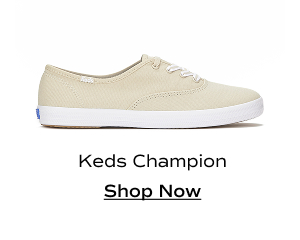 A side view of the Keds Champion Canvas Lace-Up in oatmeal. Shop Now.