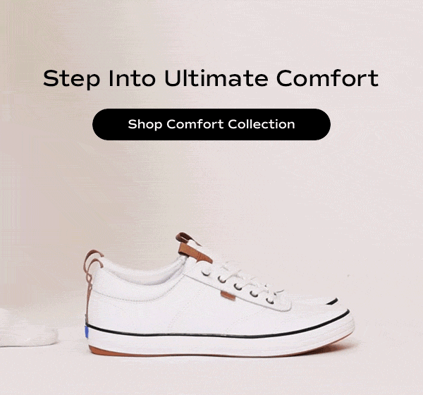 A short video of a pair of socked feet walking up to the Center III Leather Lace-Ups in white, the feet easily slide into the sneakers without the use of hands. Text overlaid on the video says Step Into Ultimate Comfort. Shop Comfort Collection.