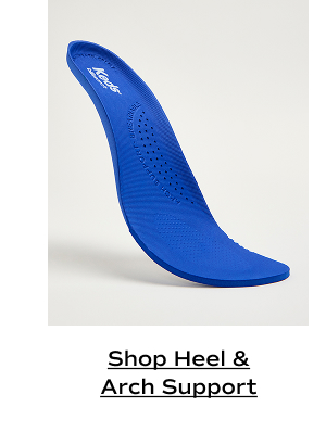 A closeup of the removable, rinseable BlissArch footbed, positioned to showcase the insole’s breathable perforations and molded, supportive design. Shop Heel & Arch Support.