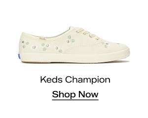 A side view of the Keds Champion Canvas Floral Embroidery Lace-Up in egret. Shop Now.