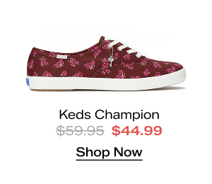A side view of the Keds Champion Canvas Print Floral Lace-Up in burgundy. The style was $59.95 and is now $44.99 for a limited time. Shop Now.