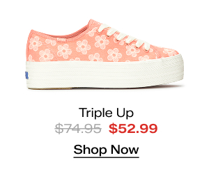 A side view of the Triple Up Canvas Floral Embroidery Lace-Up in neon coral which was $74.95 and is now $52.99 for a limited time. Shop Now.