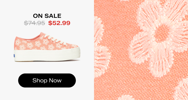 A side view of the Triple Up Canvas Floral Embroidery Lace-Up in neon coral on the left and a close-up of the floral embroidery on the right. The style was $74.95 and is now on sale for $52.99. Shop Now.
