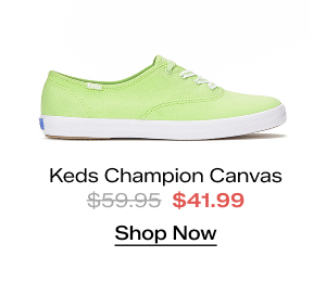 A side view of the Keds Champion Canvas Lace-Up in light lime green. The style was $59.95 and is now $41.99 for a limited time. Shop Now.
