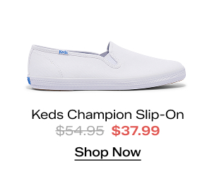 A side view of the Keds Champion Canvas Slip-On in white. The style was $54.95 and is now $37.99 for a limited time. Shop Now.