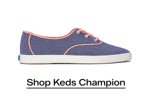 A side view of the Keds Champion Point Low Wave Nautical Chambray Lace-Up in blue/neon coral. Shop now.