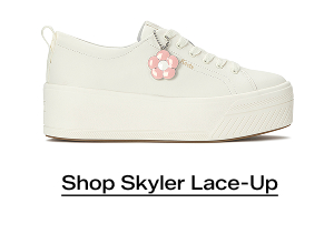 A side view of the Skyler Leather Daisy Charm Lace-Up in snow white. Shop now.